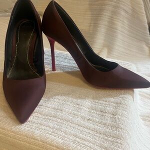 Purple jeweled high heel with red heel accents